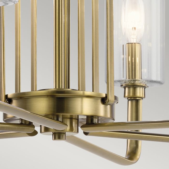 Kimrose Ø68 Laiton brossé suspension De Elstead Lighting - Les abat-jour cylindriques en verre sont transparents et présentent des rainures verticales, créant un effet d'éclairage unique et subtil.