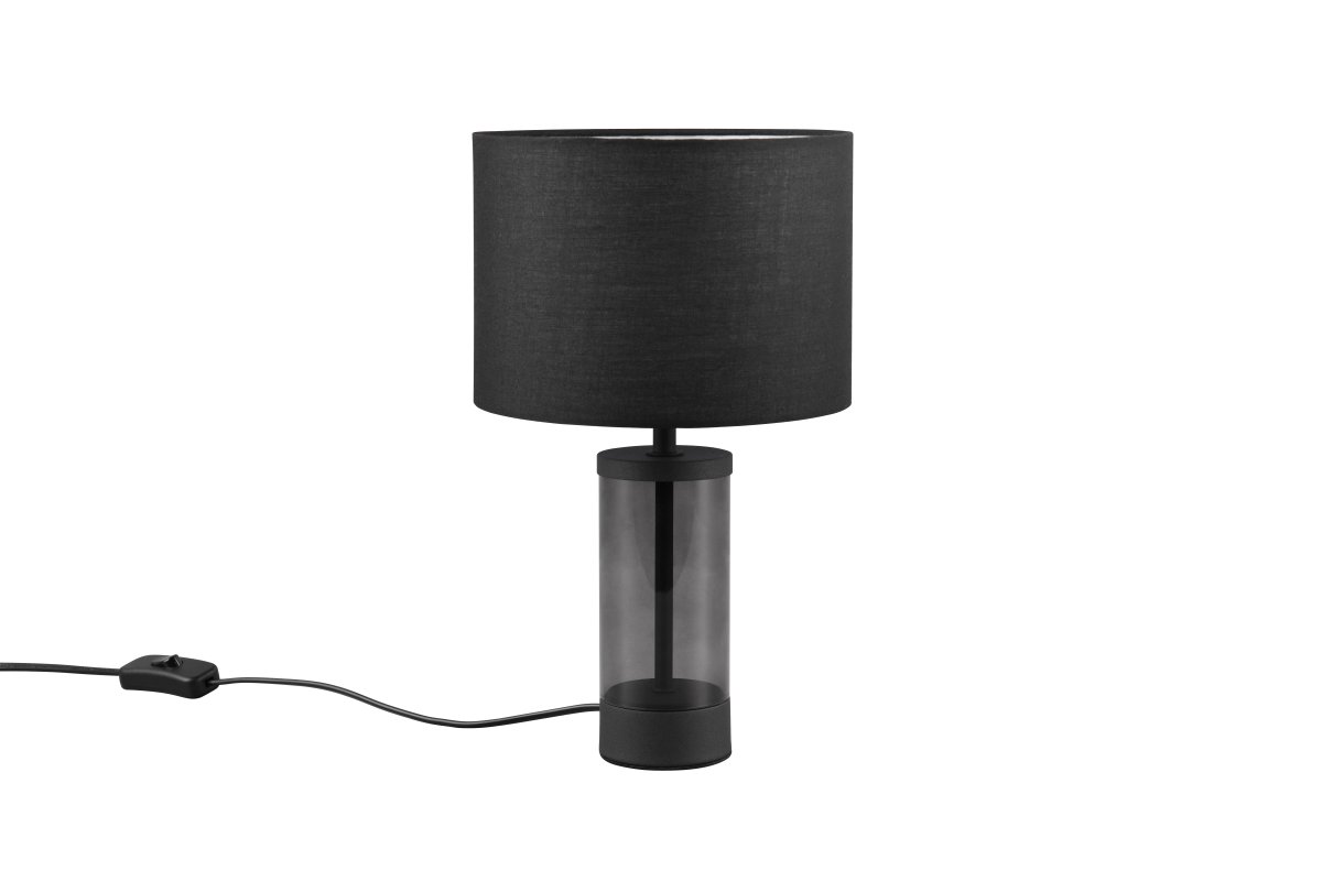 Grazia 34cm Noir lampe de table De Trio Lighting - La lampe de table Grazia combine un élégant abat-jour en tissu avec une base cylindrique élégante en verre et en métal, créant une impression harmonieuse et élégante.