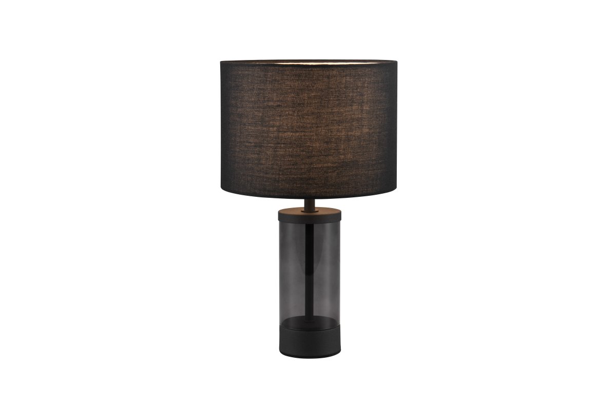 Grazia 34cm Noir lampe de table De Trio Lighting - La lampe de table Grazia combine un élégant abat-jour en tissu avec une base cylindrique élégante en verre et en métal, créant une impression harmonieuse et élégante.