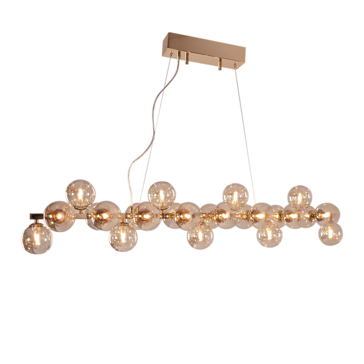Splendor 124cm Ambre suspension De By Rydéns - Le luminaire Splendor Bar est un plafonnier remarquable compos&eacute; de 25 abat-jour en verre ambr&eacute; transparent.